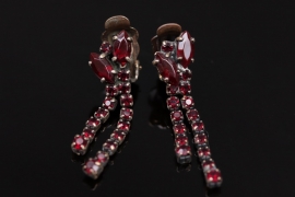 Golden ear clips with garnets