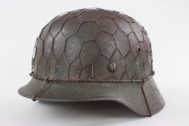 Heer M40 helmet with chicken wire and camo paint - Q62