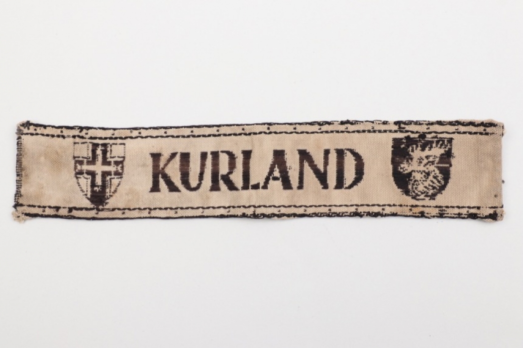 KURLAND cuff title