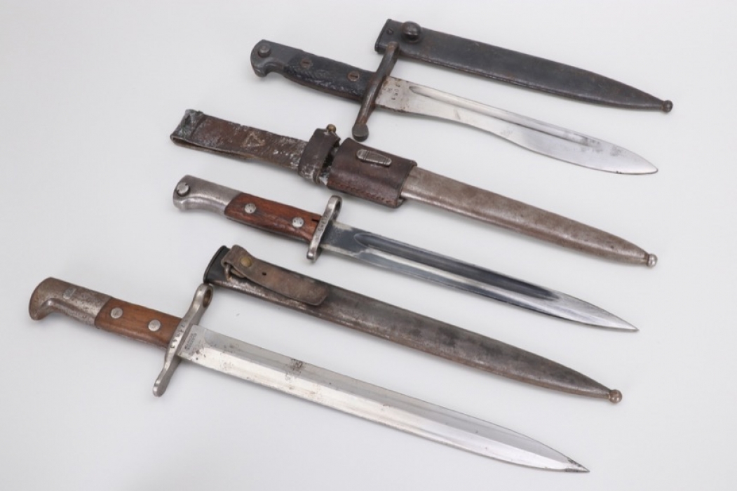 Lot of three international bayonets