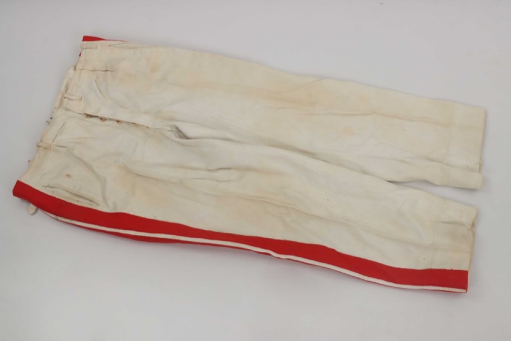 Unknown - White trousers with broad red stripes